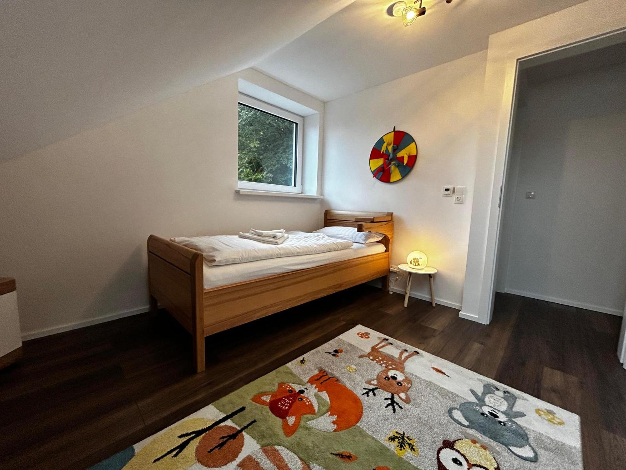 Moderne Ferienwohnung Fuer Familien Im Dachgeschoss Bosau Kültér fotó